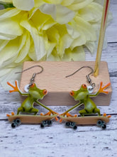 Load image into Gallery viewer, Novelty acrylic skateboard frog earrings
